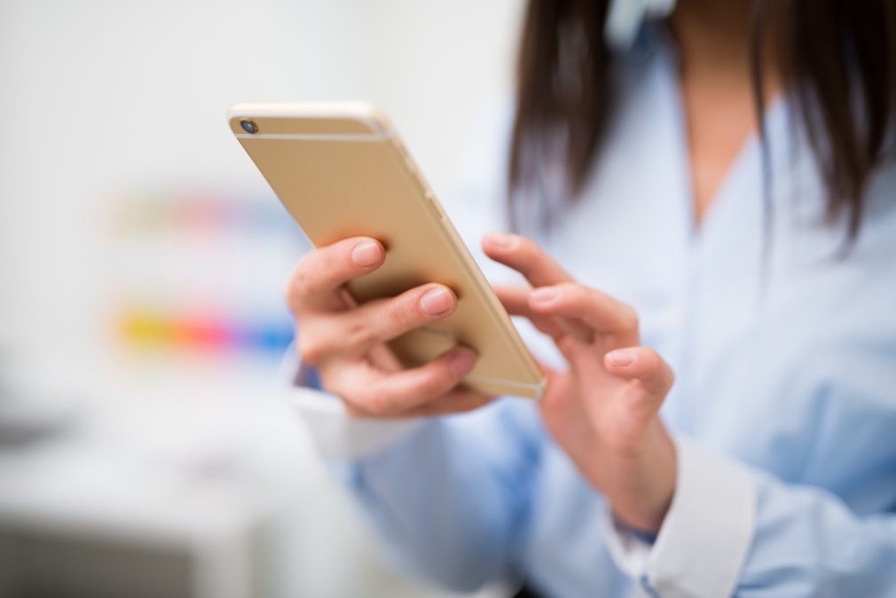 Woman using her mobile phone