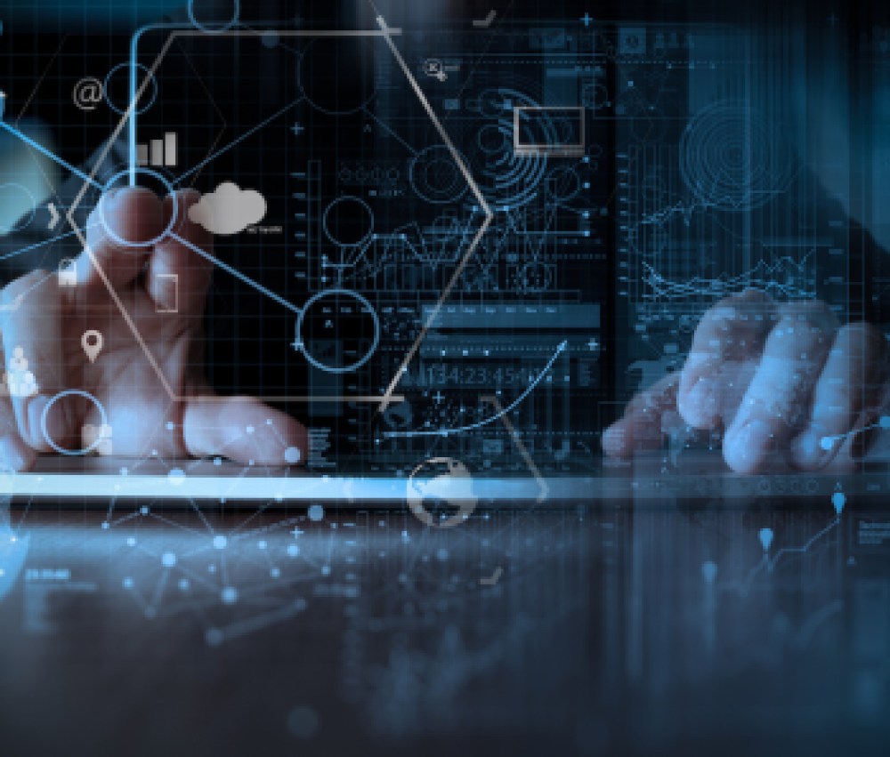 businessman hand working with modern laptop computer in modern office with virtual icon diagram