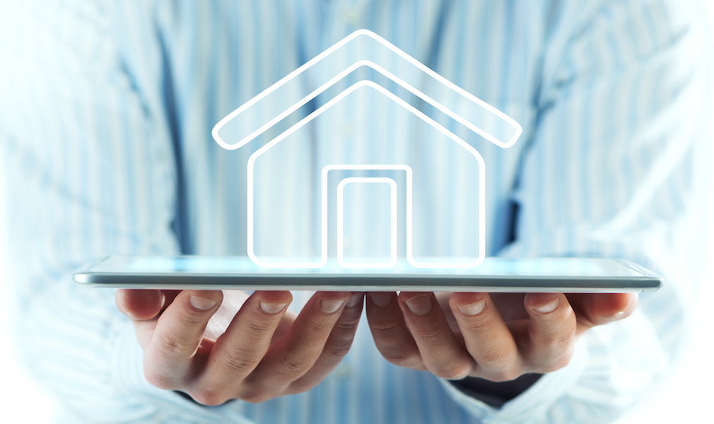 Hands holding tablet