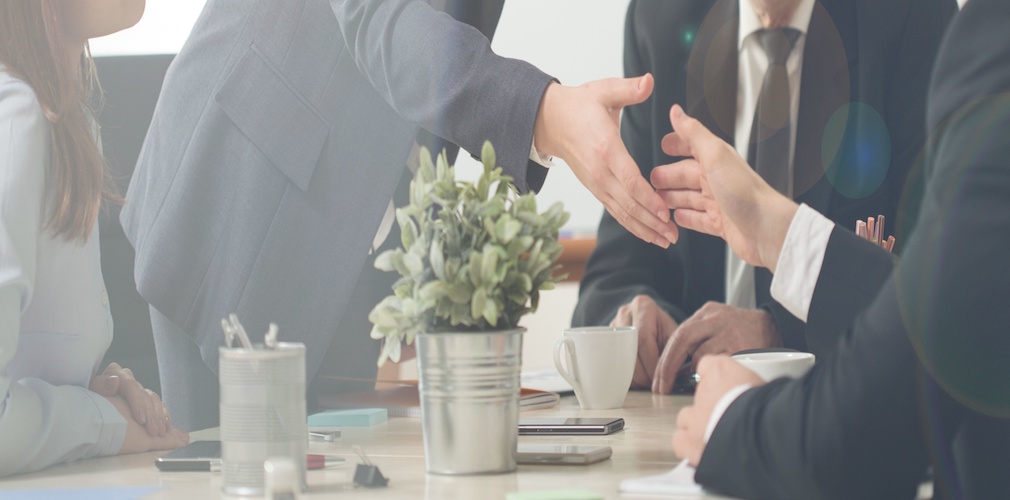 Handshake on a business meeting