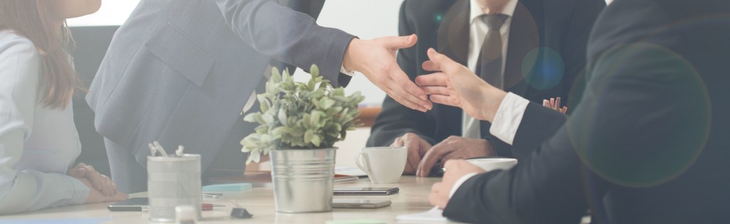 Handshake on a business meeting