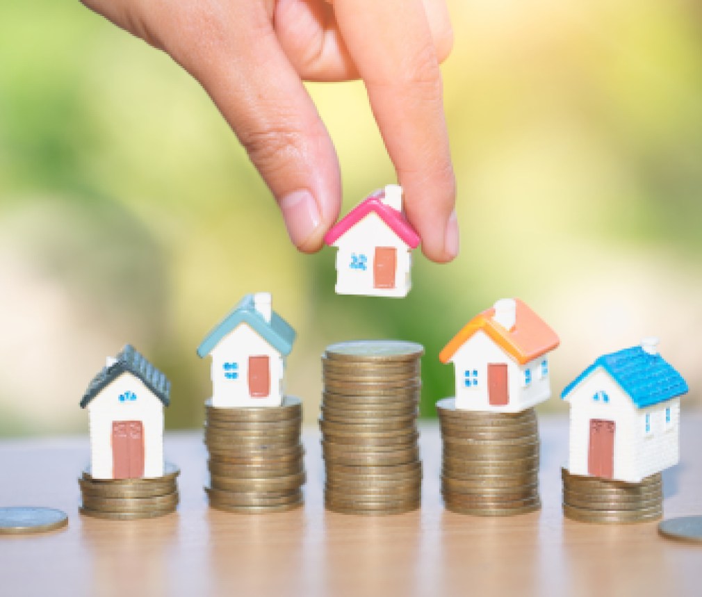 Mini house on stack of coins, Real estate investment, Save money with stack coin, Business growth investment and financial, Mortgage concept.