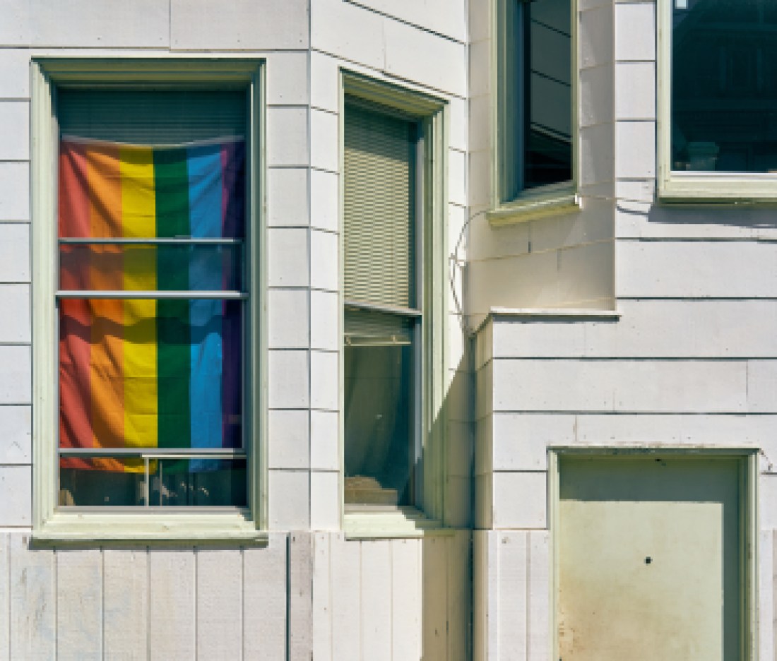 Rainbow flag in window