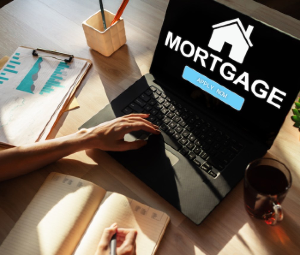 Mortgage online application form on device screen. Business and finance concept.