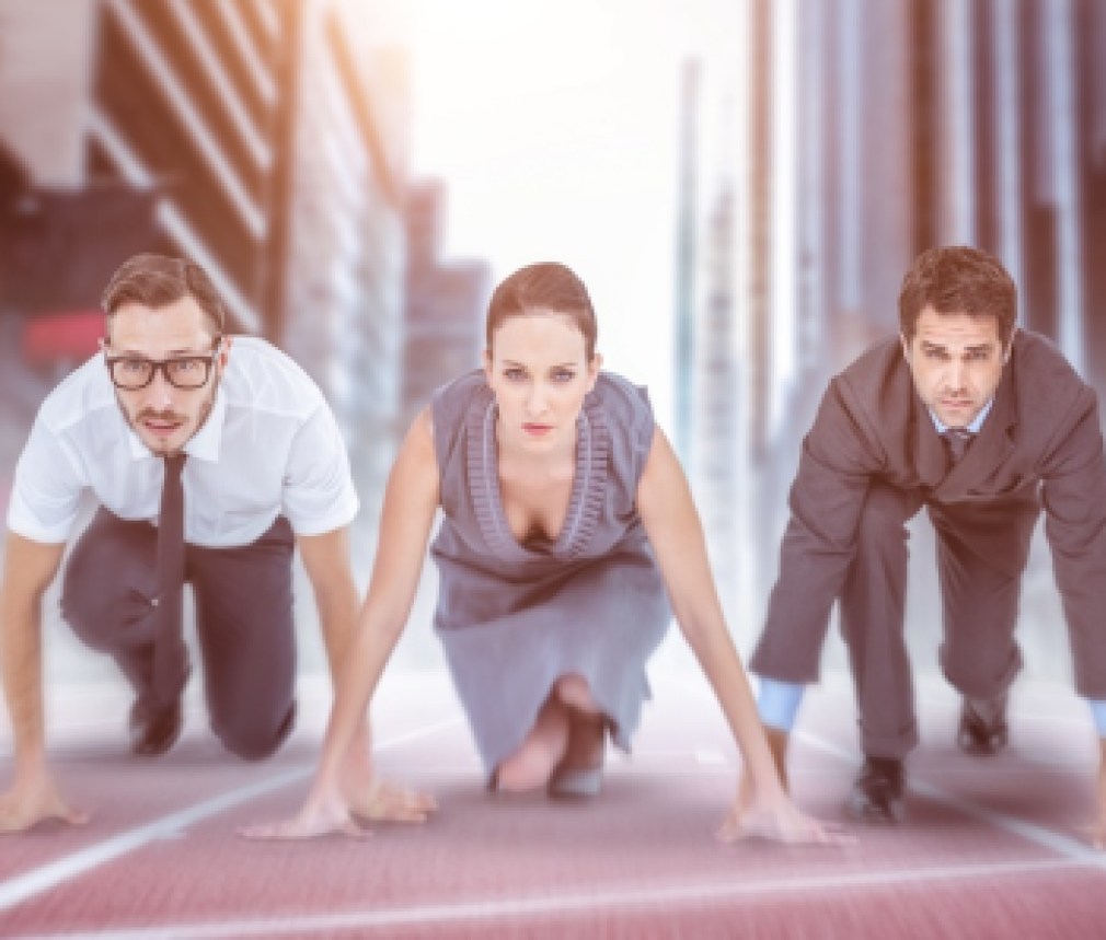 Composite image of business people ready to start race