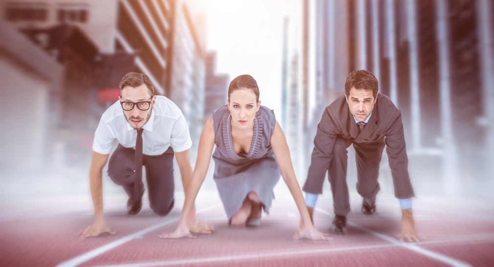 Composite image of business people ready to start race