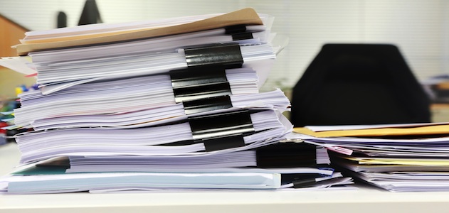 paper-stack-messy-desk