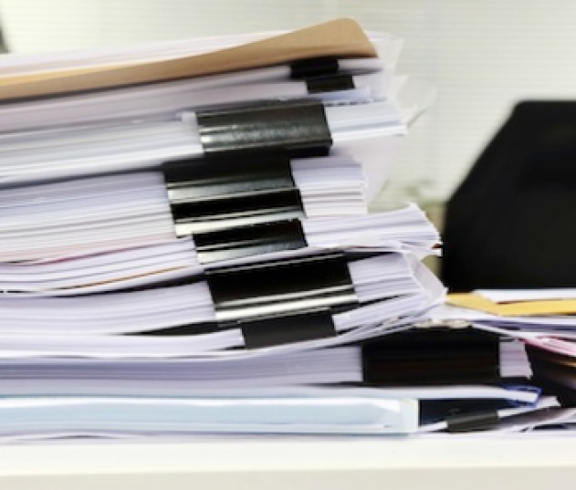 paper-stack-messy-desk