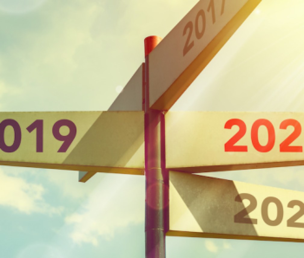 2020 New Year. Direction indicator in the number of the year, against the sky. New Year concept