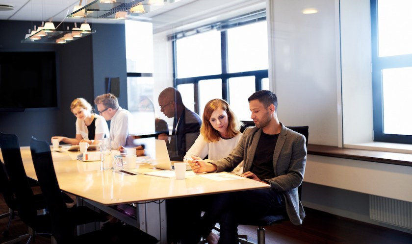 Group of executives working in conference room
