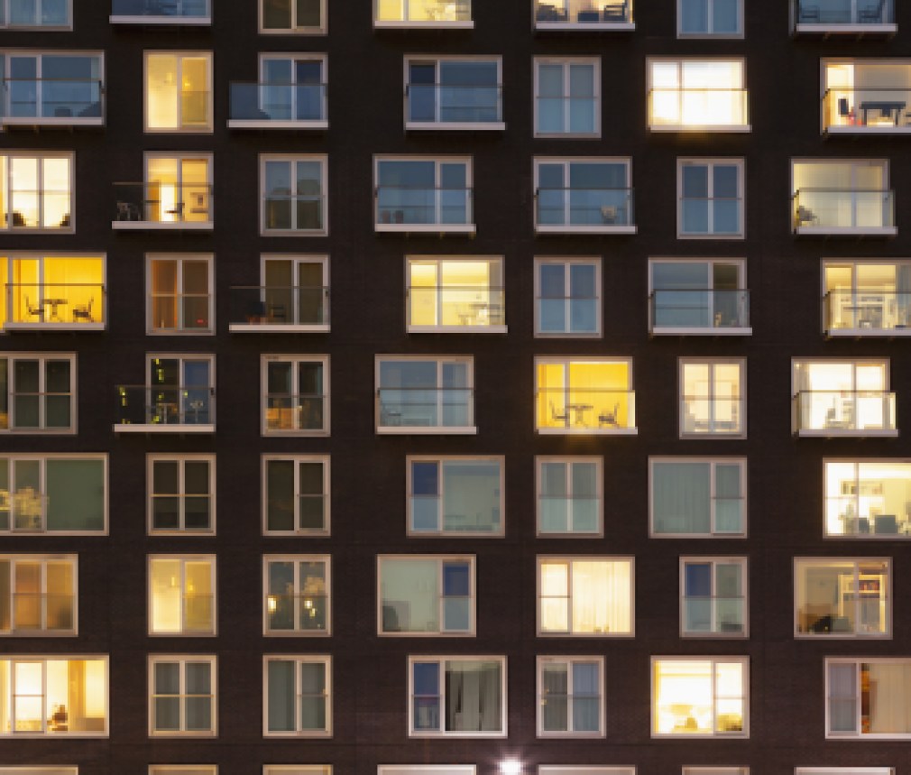 Modern apartment block at dusk