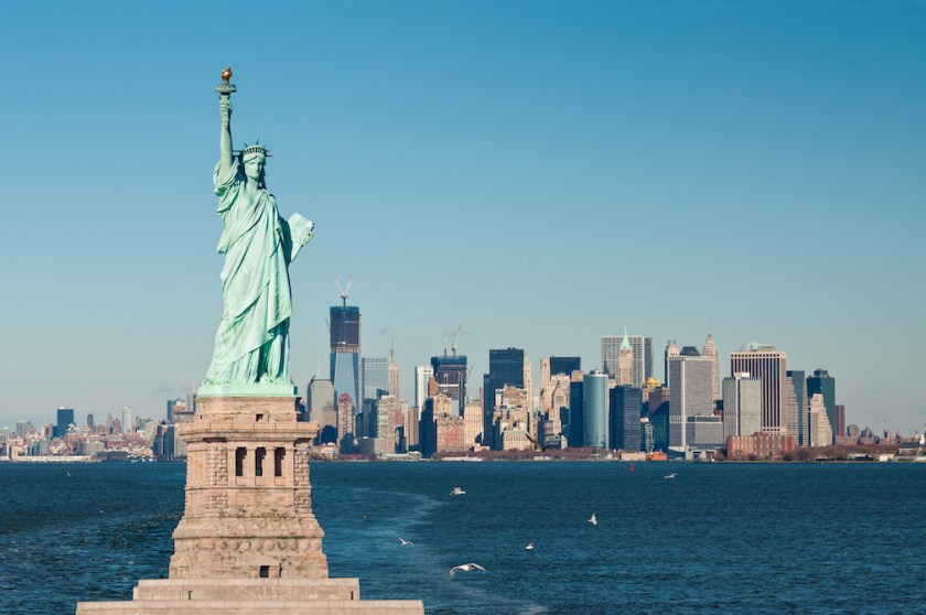 The statue of liberty against the New York City skyline