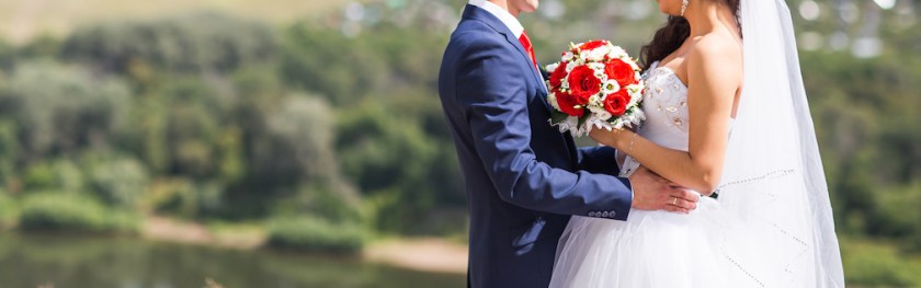 Bride and groom on their wedding day outdoors