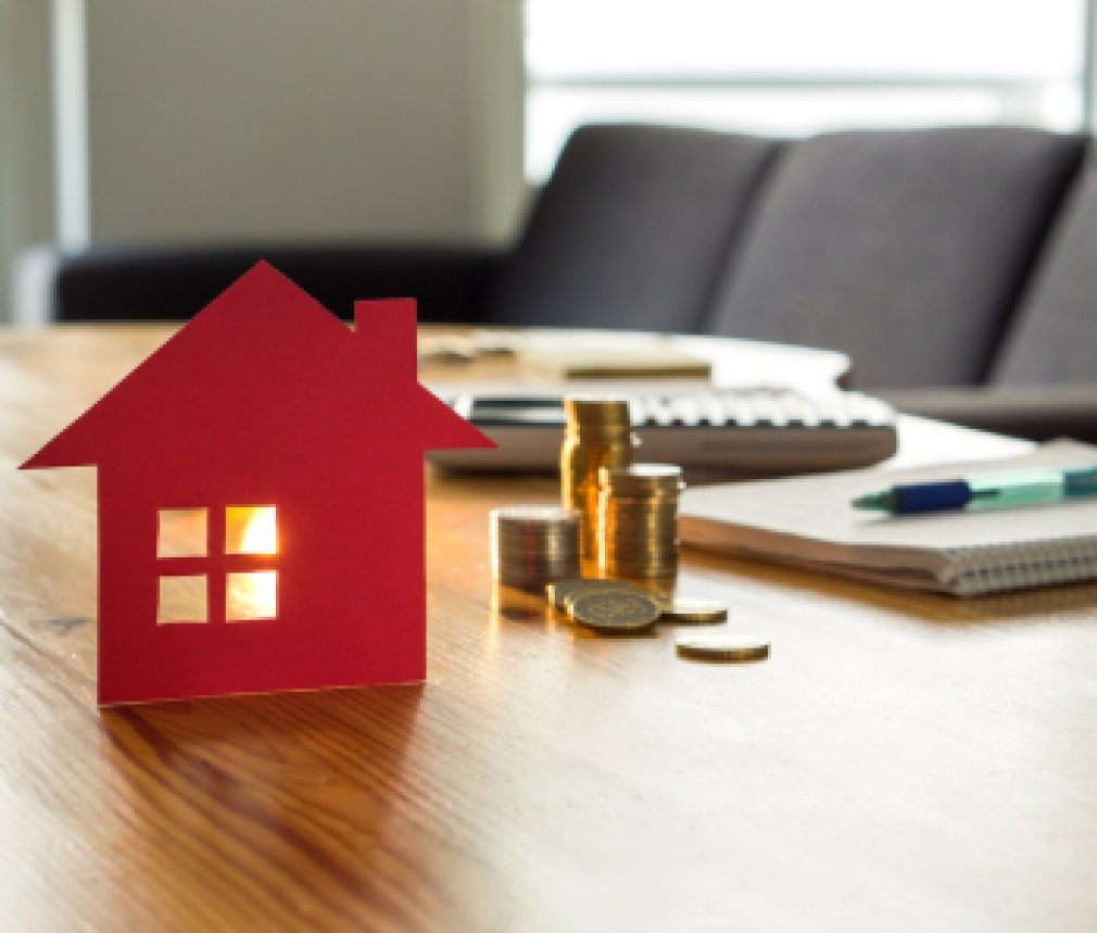 Savings for home, buying houses, real estate or housing benefit concept. Counting money for rent, mortgage or insurance. Future and financial planning.