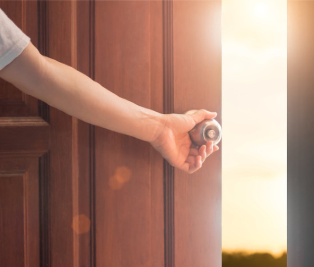 Women hand open door knob or opening the door,grand opening,Close up hand open door.