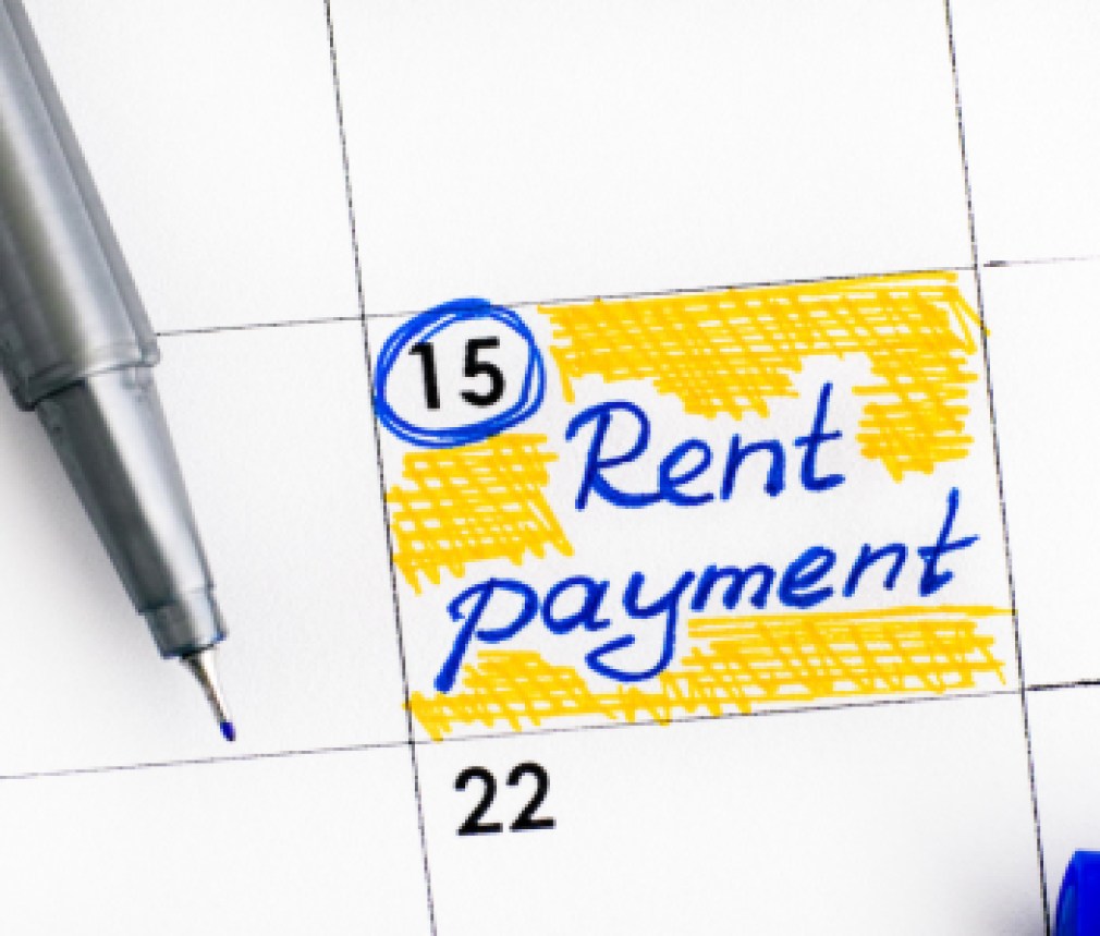 Reminder Rent Payment in calendar with blue pen.