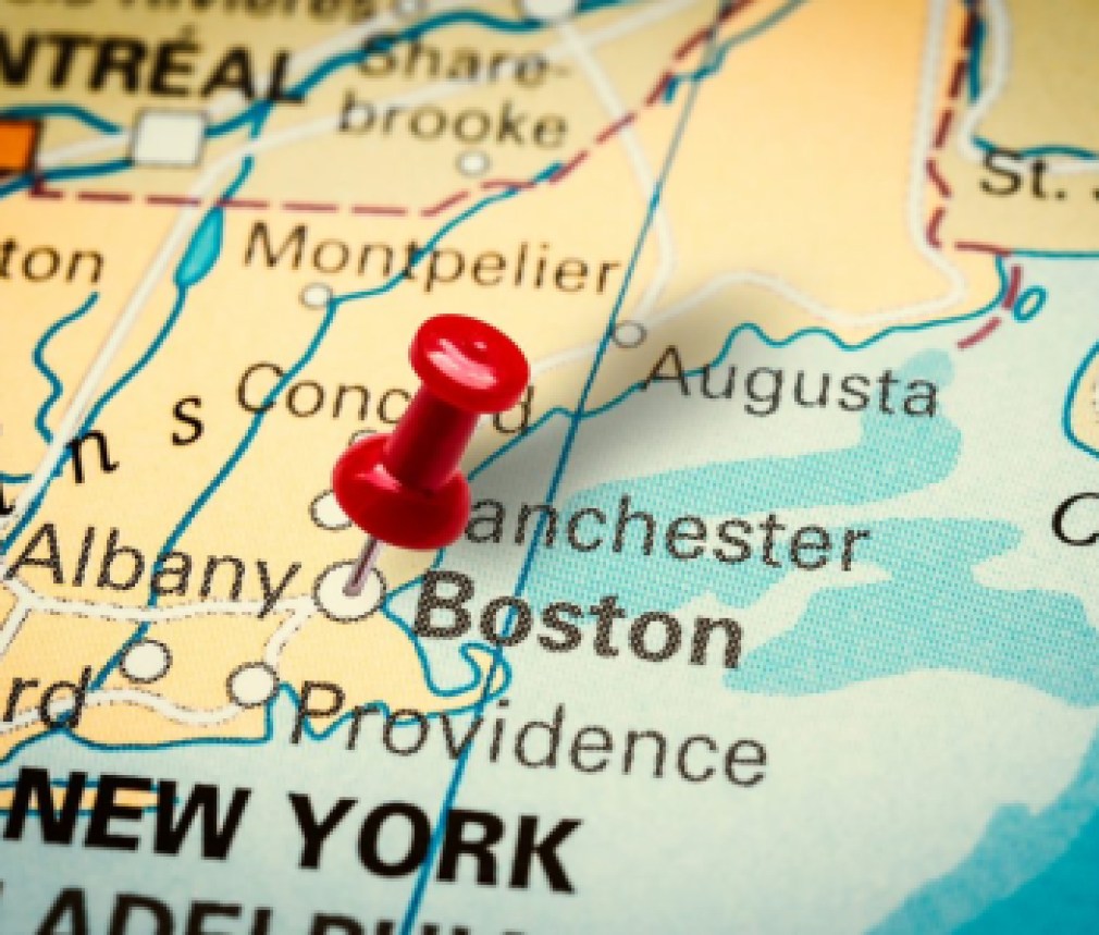 Pushpin pointing at Boston city in Massachusetts, America