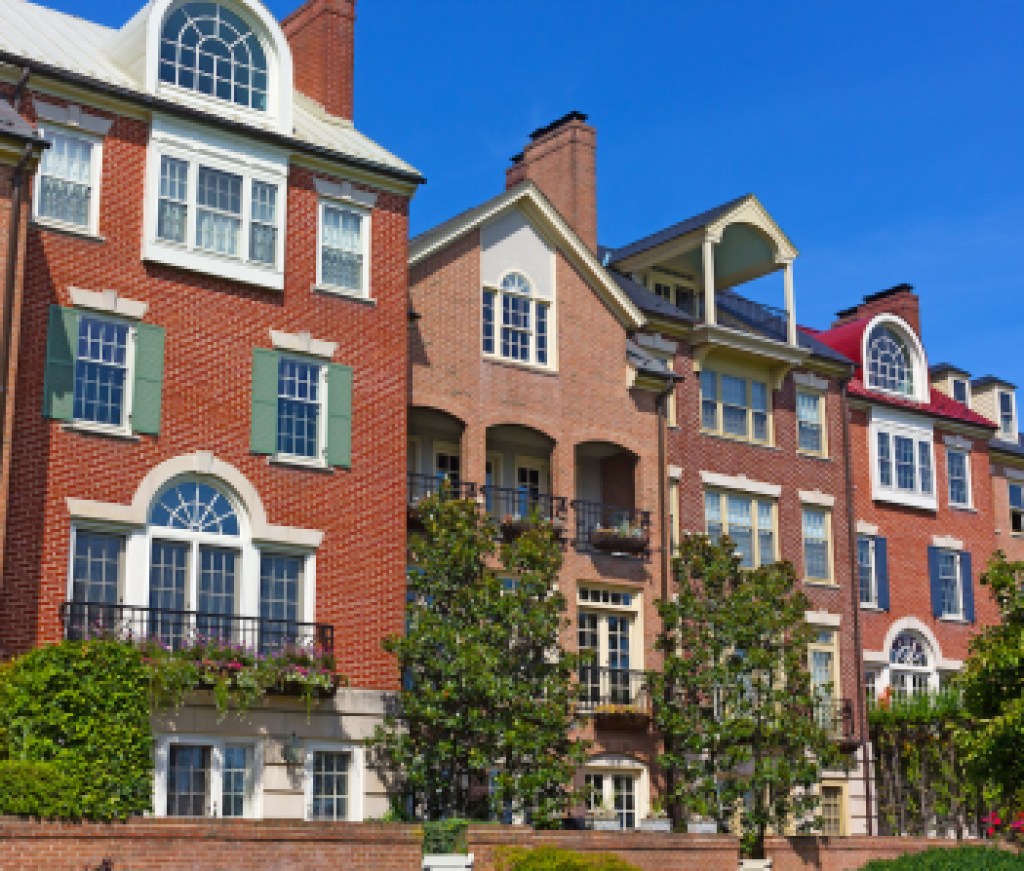 Modern houses facing Old Town Alexandria waterfront in Virginia, USA. Highly sought after residential development in Alexandria neighborhood.