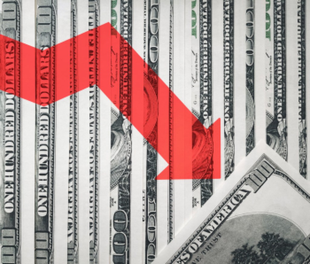 The light red arrow icon on a background of money. The concept of changing course of US dollar on the market. Devaluation, collapse, stagnation of the economy.