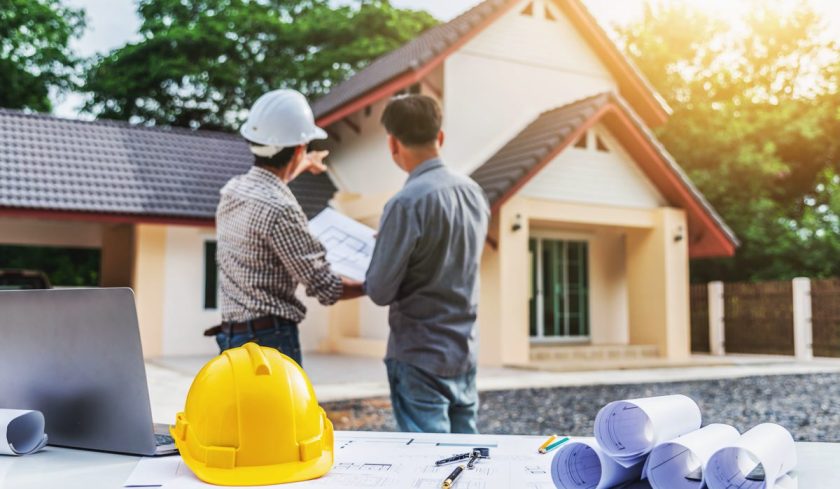 Two business man professional engineer worker at the house building.