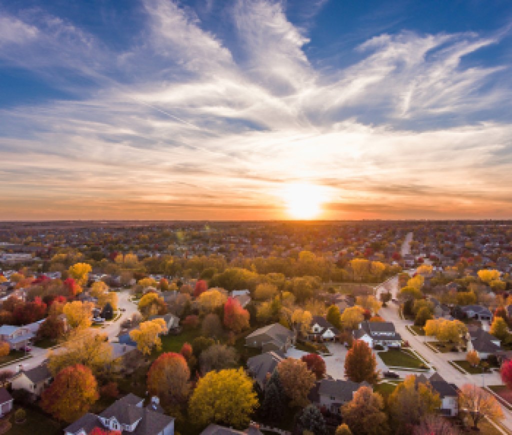 Sunset in the fall over the suburbs