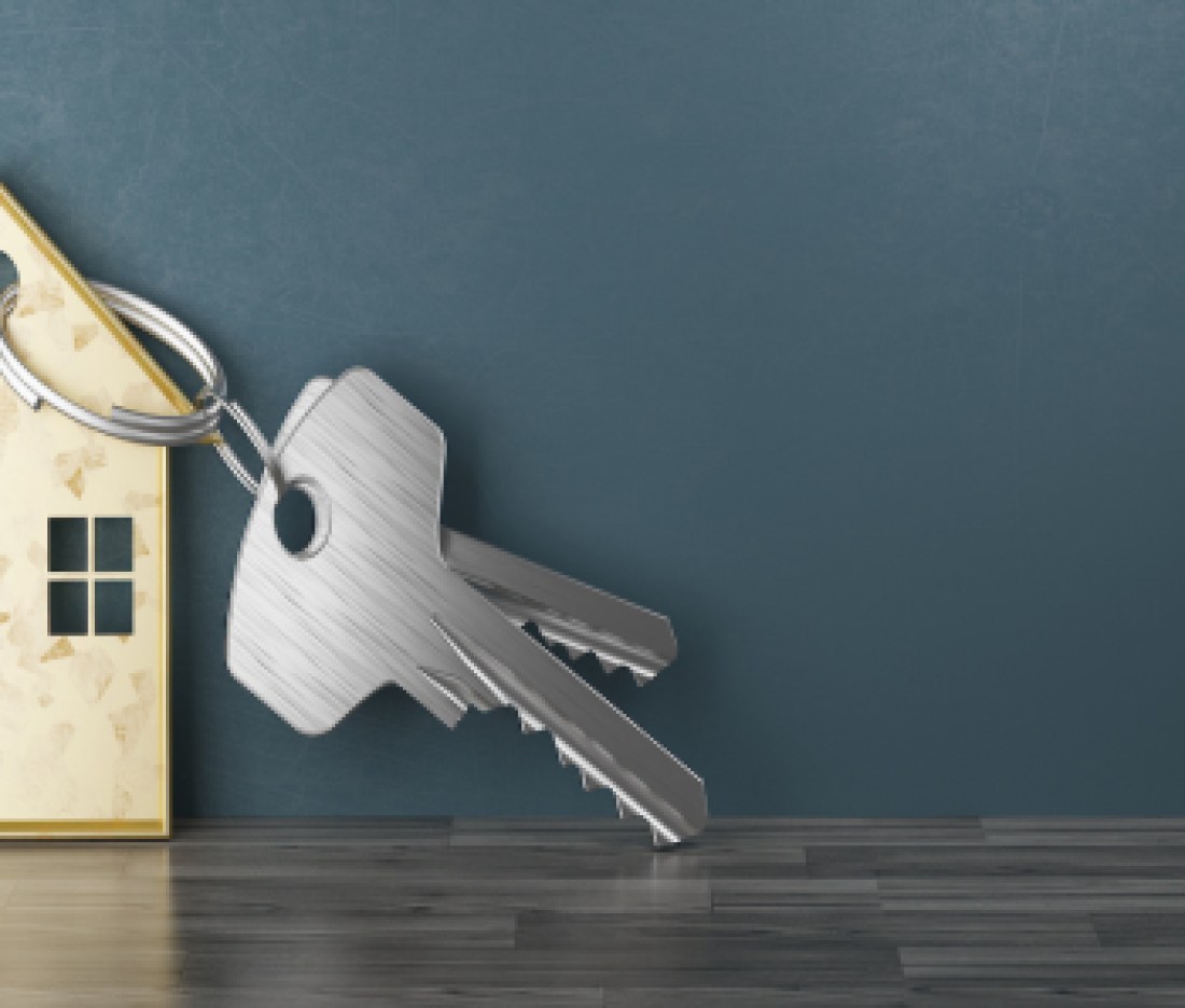 Mortgage, investment, real estate and property concept - close up of house keys. 3d rendering