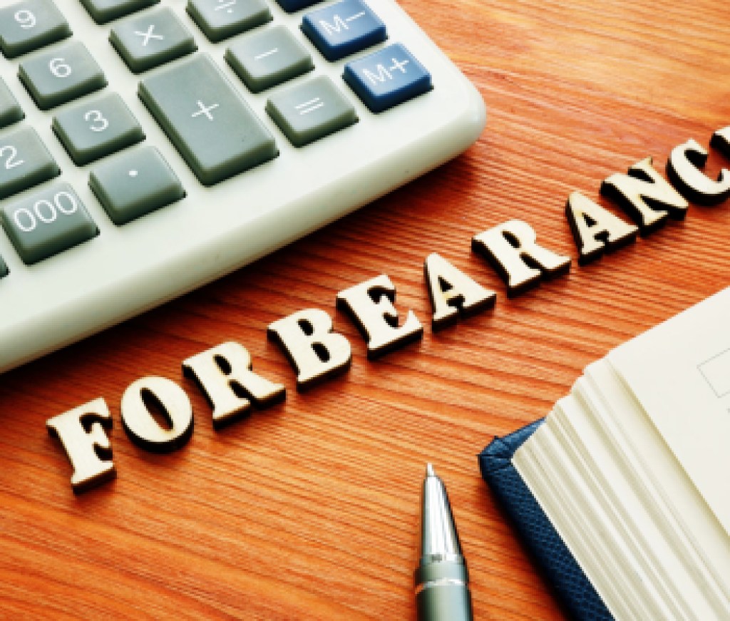 Forbearance word from wooden letters.