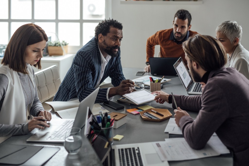 Multiethnic Group of Businesspeople on a Meeting