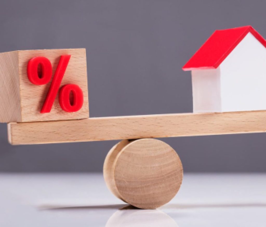 Seesaw Showing Balance Between Percentage Symbol And House Model