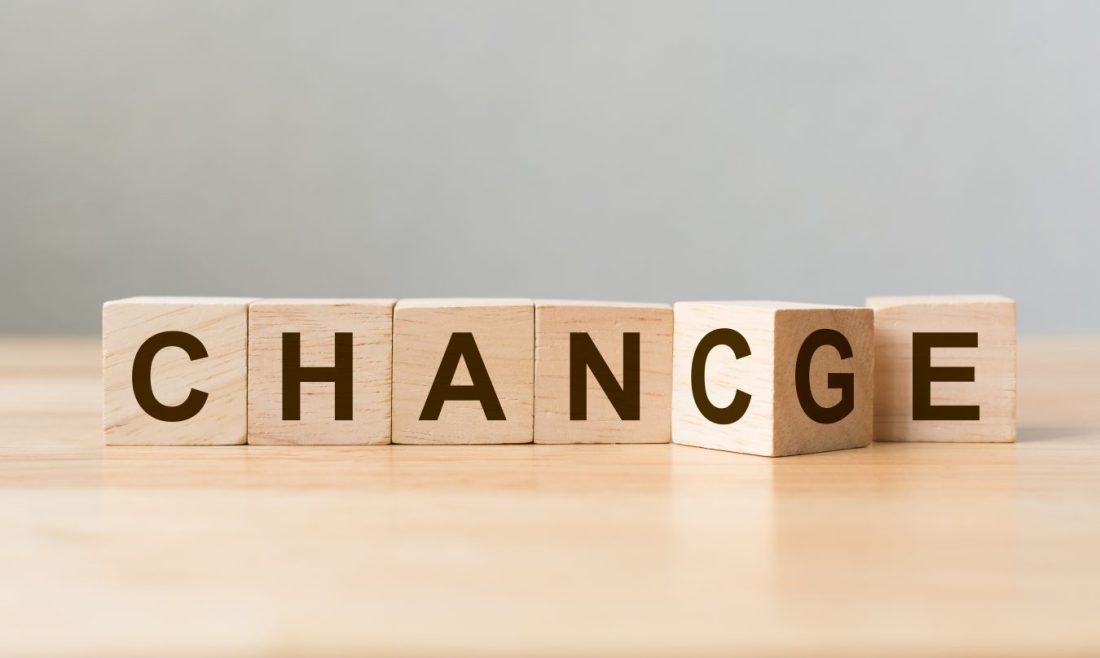 Wooden cube flip with word "change" to "chance" on wood table, Personal development and career growth or change yourself concept