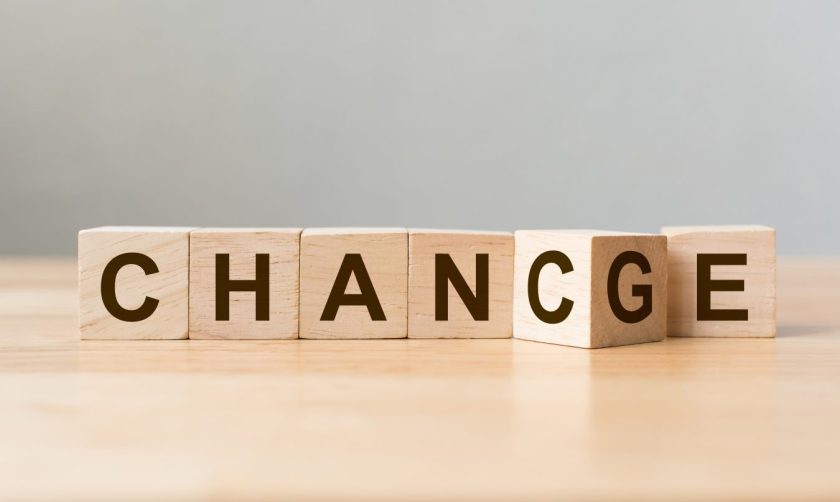 Wooden cube flip with word "change" to "chance" on wood table, Personal development and career growth or change yourself concept