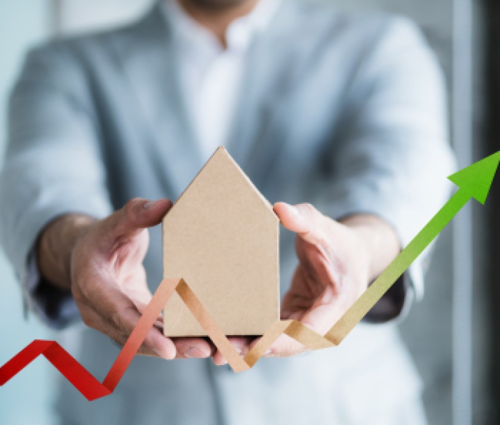 financial asset business concept with businessman hold house model with financial chart graph symbol