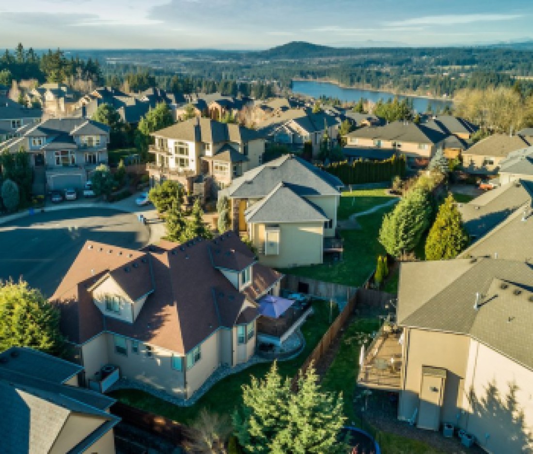 Beautiful luxury neighborhood in the Pacific Northwest photographed at sunset from the air