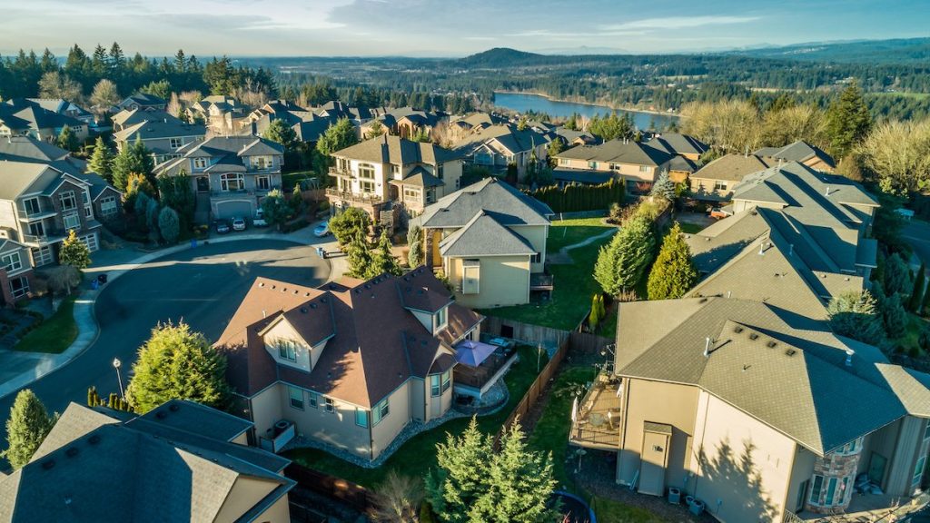 Beautiful luxury neighborhood in the Pacific Northwest photographed at sunset from the air