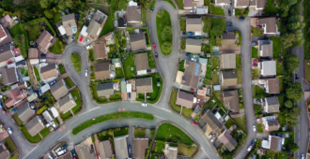 Top down aerial view of urban houses and streets in a residential area of a Welsh town