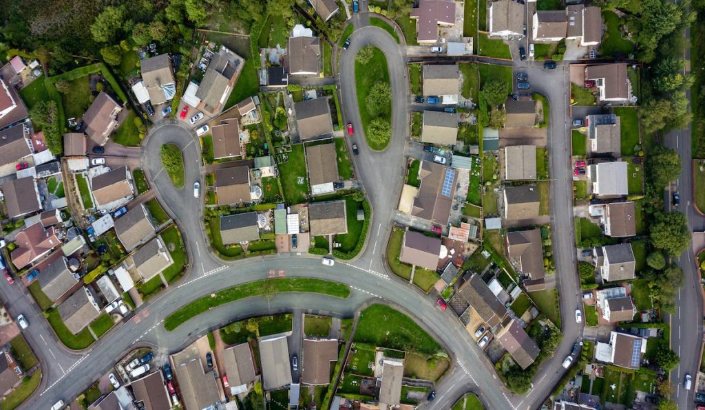 Top down aerial view of urban houses and streets in a residential area of a Welsh town