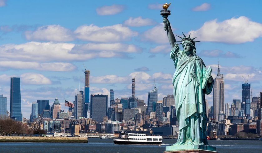 The Statue of Liberty over the Scene of New york cityscape river side which location is lower manhattan,Architecture and building with tourist concept