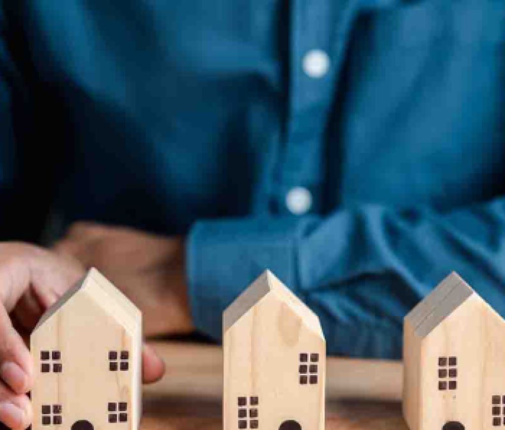 man-with-wooden-houses