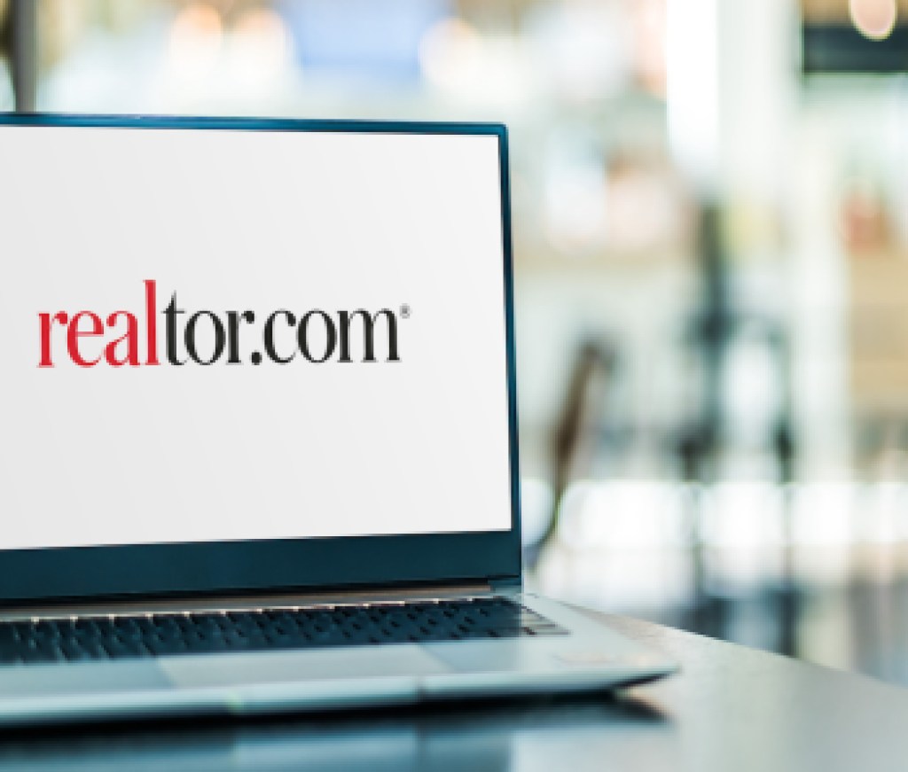 Laptop computer displaying logo of Realtor.com