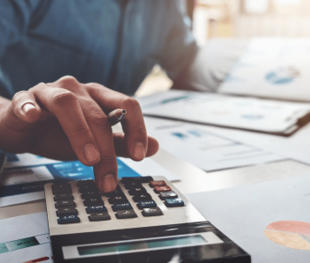 Home buyer calculating their budget on a calculator