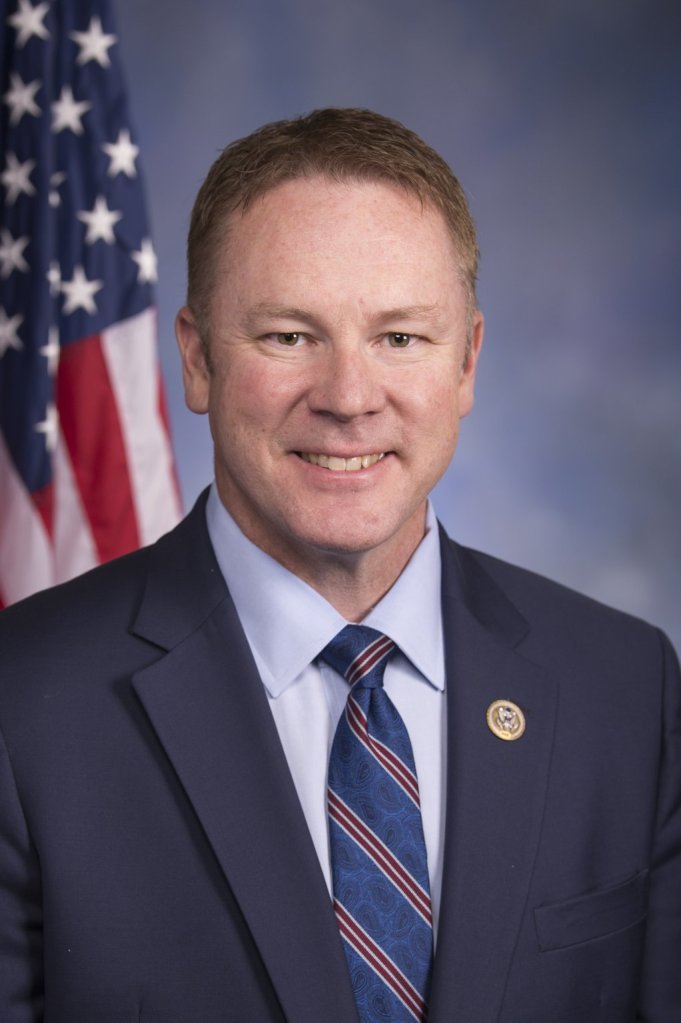 The official portrait of Rep. Warren Davidson, congressman of Ohio.