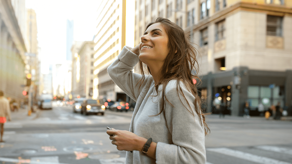 Real estate agent in downtown of a sunny California city