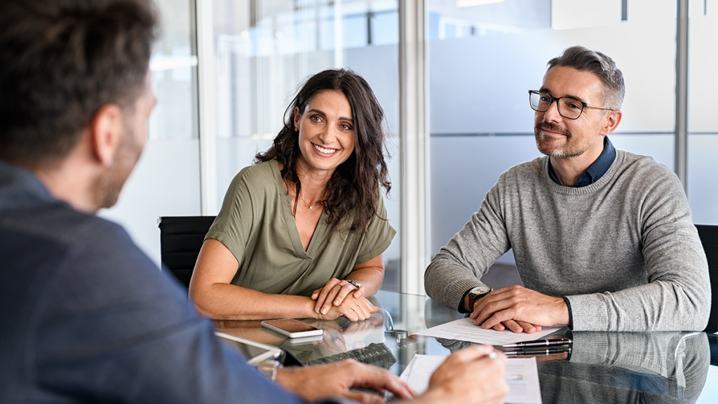 Couple meeting with a mortgage loan officer