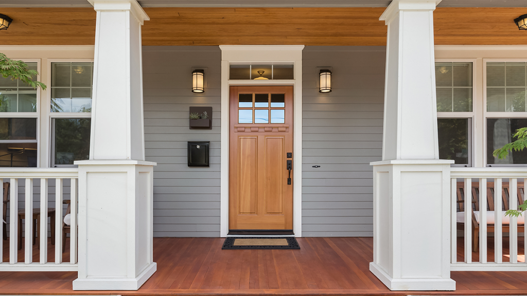 Front door of a pretty Craftsman-style home