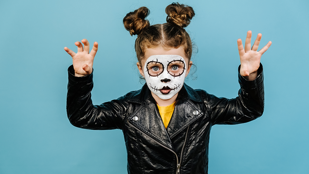 Little-girl-with-painted-face-for-Halloween